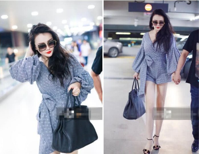 冉莹颖穿衣弃紧从宽合体邹市明，倒穿羊腿袖像棒槌，网友:是真爱