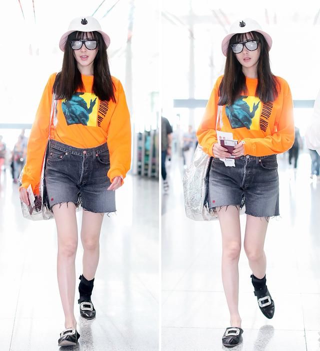 张天爱一改往日御姐风，现身机场剪了个小刘海，简直像换了张脸