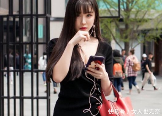 街拍短裤凸显修长美腿和完美身材，小姐姐的眼神放荡不羁！