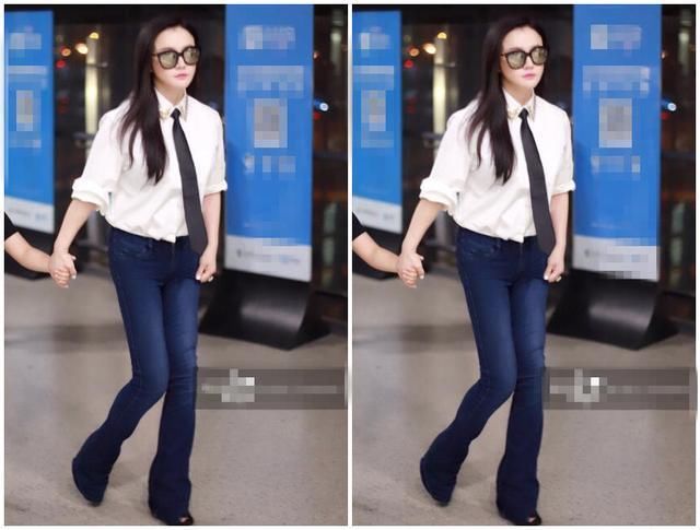 冉莹颖用力过猛，紧身牛仔喇叭裤不是一般的紧，网友:不难受吗?