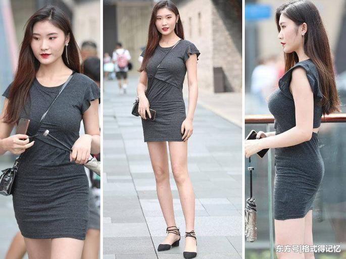 美女穿紧身的连衣裙，再加上这样的背包方式更显女人味！