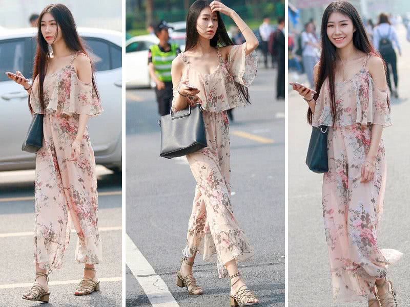 小姐姐身穿雪纺吊带衣,清爽轻盈,迷人的笑容很有女神范!