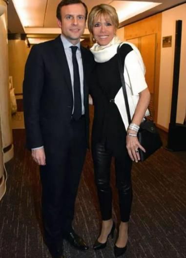 法国“第一夫人”粉衣亮相，却扮嫩失败，发型杂乱且满脸皱纹!