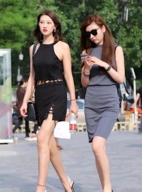 街拍：苗条美腿性感的小姐姐，搭配上性感大方像风景线！