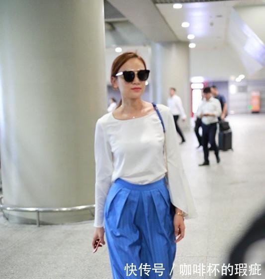 叶一茜现身机场，一条蓝色高腰裤穿得如此显瘦，这才是真正的细腰
