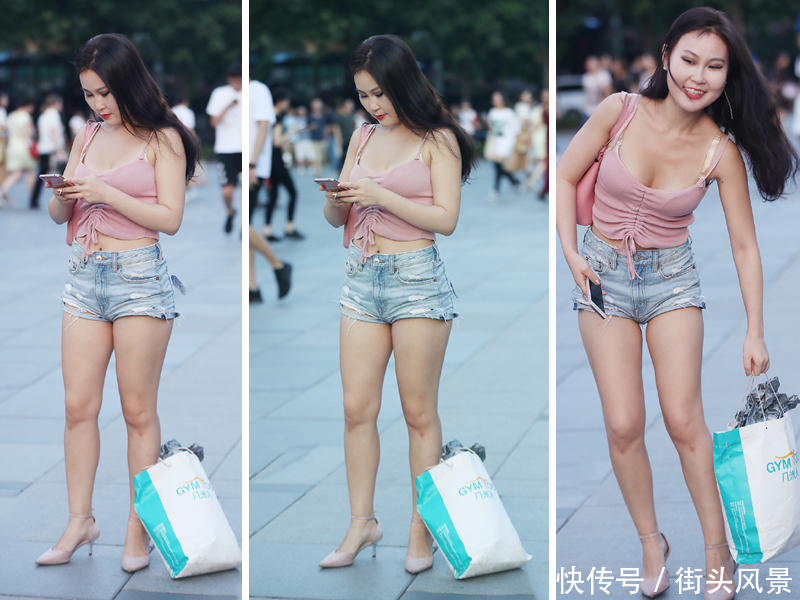 小姐姐身穿粉色吊带衣,手中的东西太重,弯腰放东西的姿态真美!