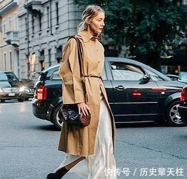  『时髦』最近火了一种穿法，叫“冬外套+春裙子”，时髦保暖，明星都上瘾