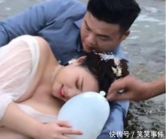  [摄影师]新娘抱着装满水的气球拍照，当助理刺破，抓拍到华丽画面！