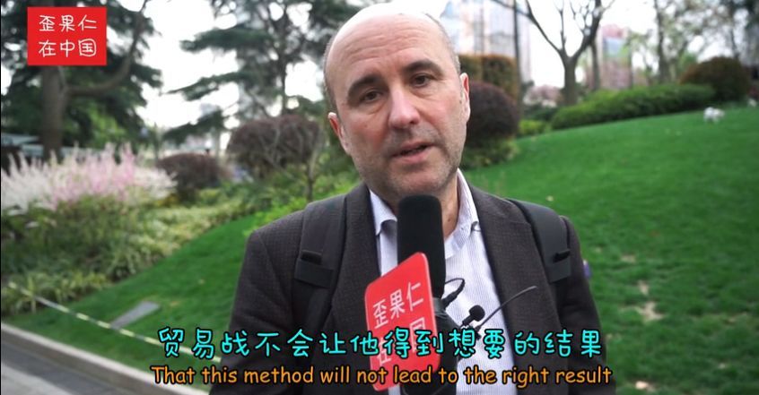 街采外国人:中美贸易战谁会赢?