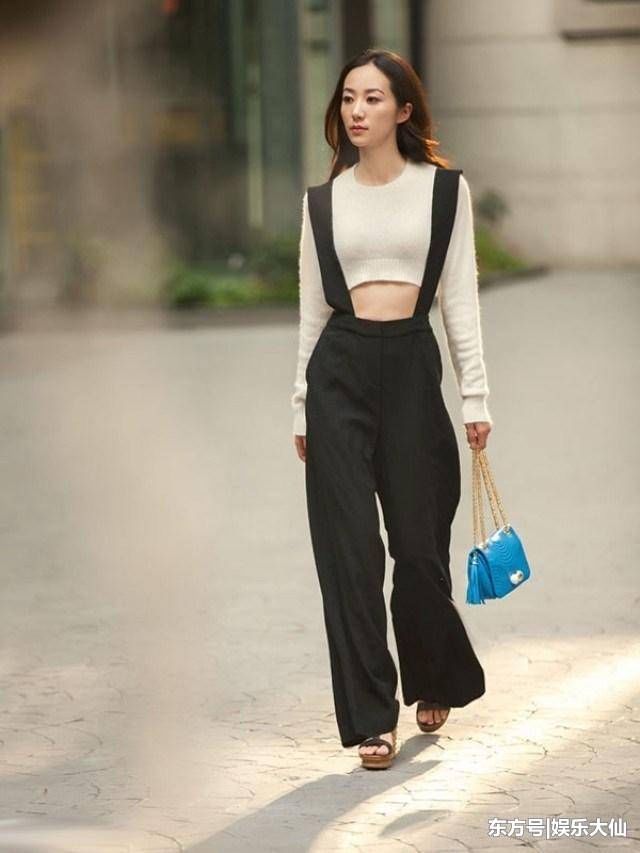 一直穿衣保守的韩雪,居然穿上了露脐装,不过这腰是真的细!