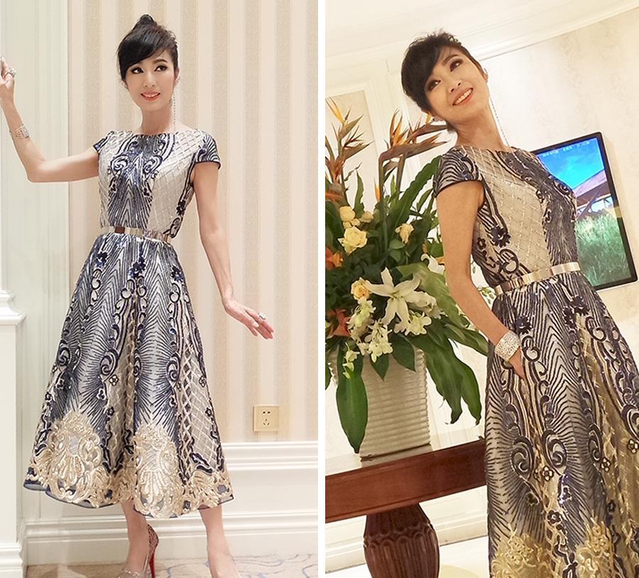 63岁米雪要逆天？穿刺绣连衣裙减龄不够，还扎了少女系的丸子头