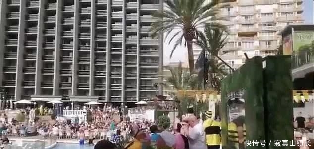 紧急状态@西班牙疫情失控病例猛增!街边却一片祥和,泳池里人挤人!