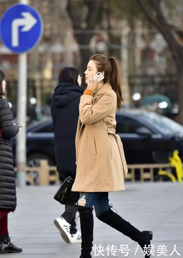 喜欢■街拍:姑娘在冬天很喜欢穿着长靴出行