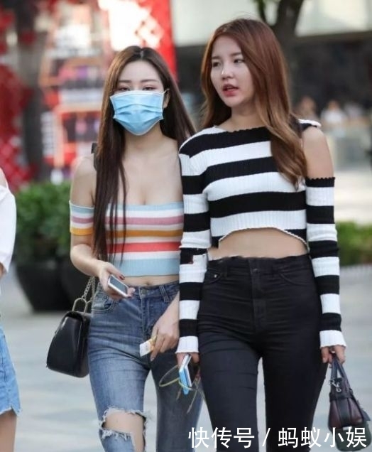 小姐姐:时尚街拍,美女端庄秀丽的身姿,清新淡雅的妆容带来优雅的观感
