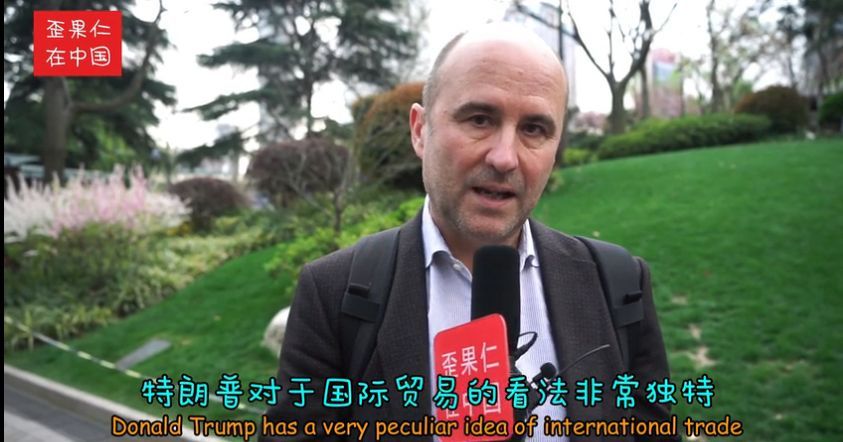街采外国人:中美贸易战谁会赢?