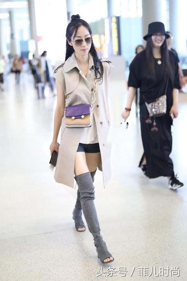 韩雪一身精装打扮现身机场，高跟配长裙显优雅又大气，女人味十足