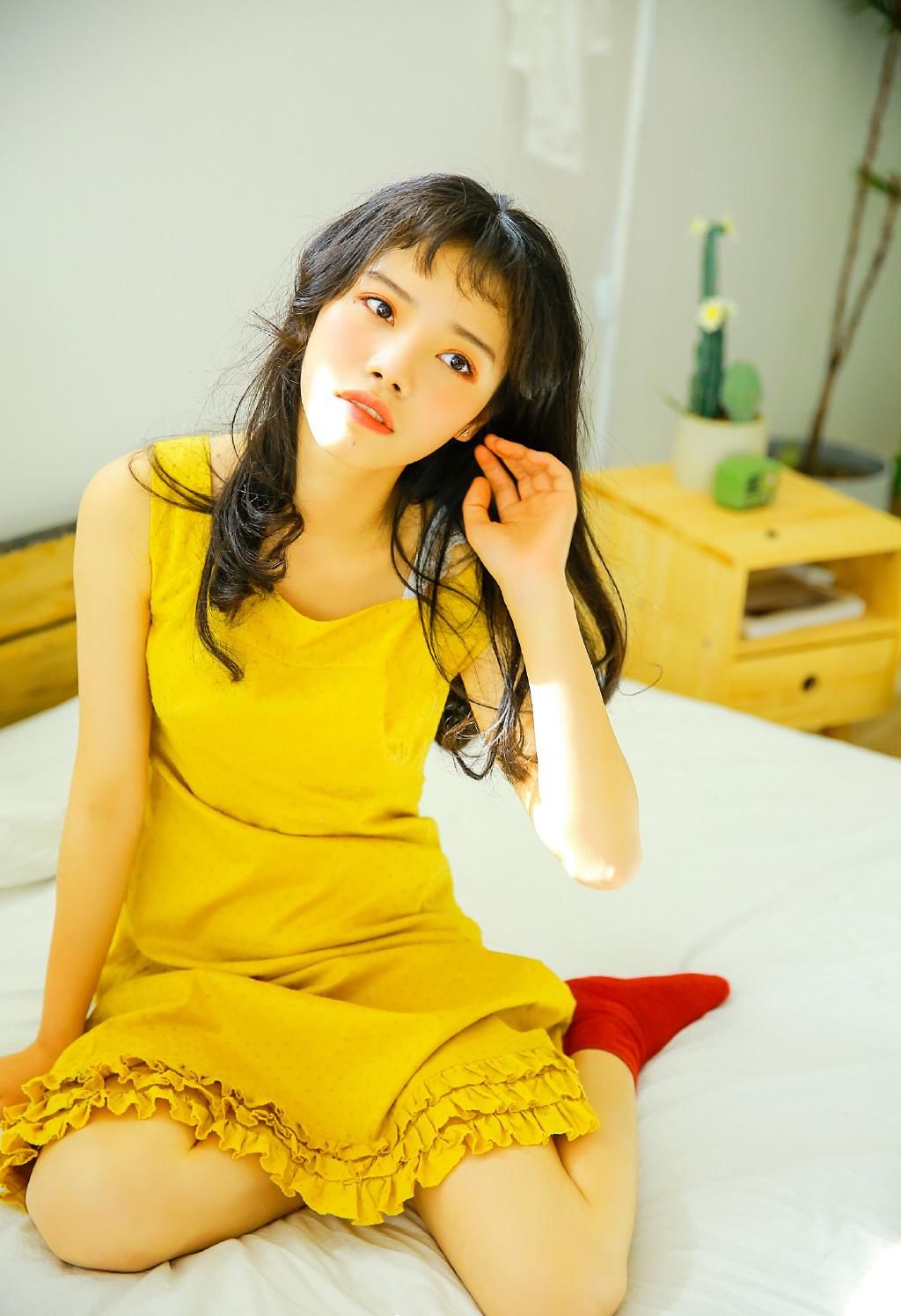 亚洲性感熟女居家床上风情诱惑图片