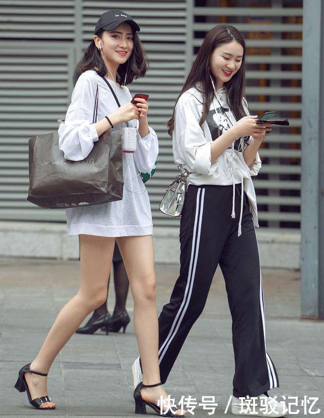 街拍：图三漂亮的短发小姐姐红黑搭配很时髦，装束也很有味道