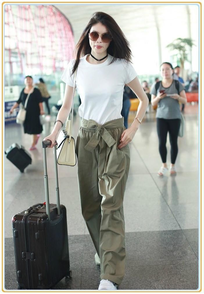 当168张钧宁和178何穗同穿绿色阔腿裤,才知道超模腿真的不好惹