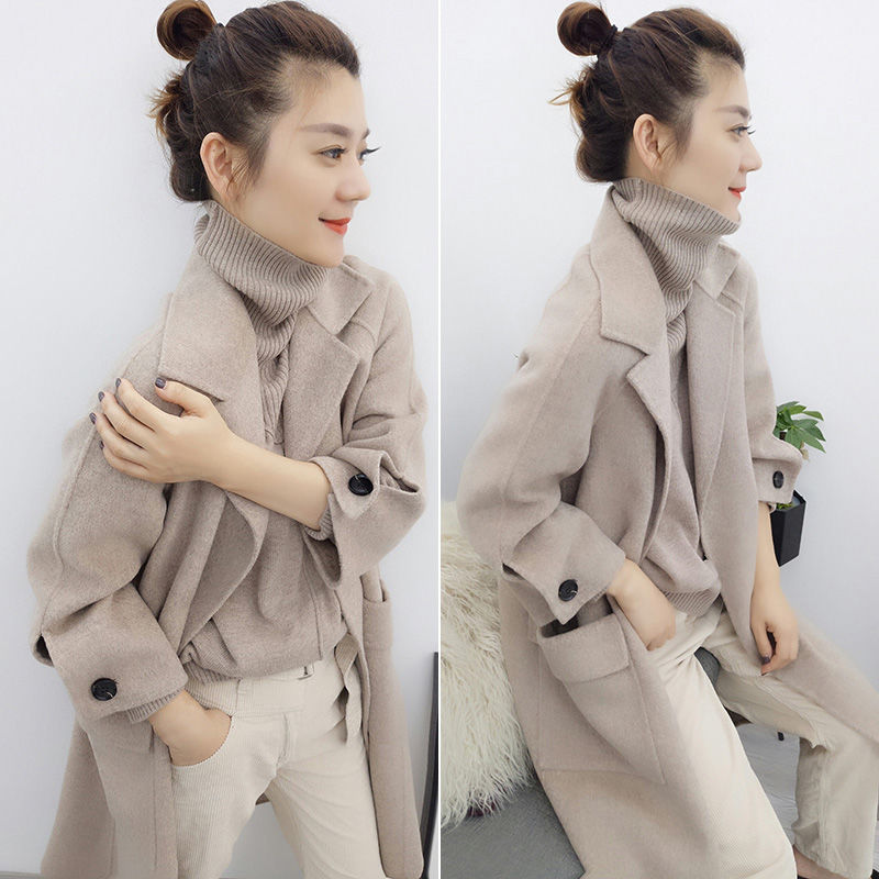 今年流行一款高档大衣:呢外套,搭配黑色打底裤,简直漂亮不像话