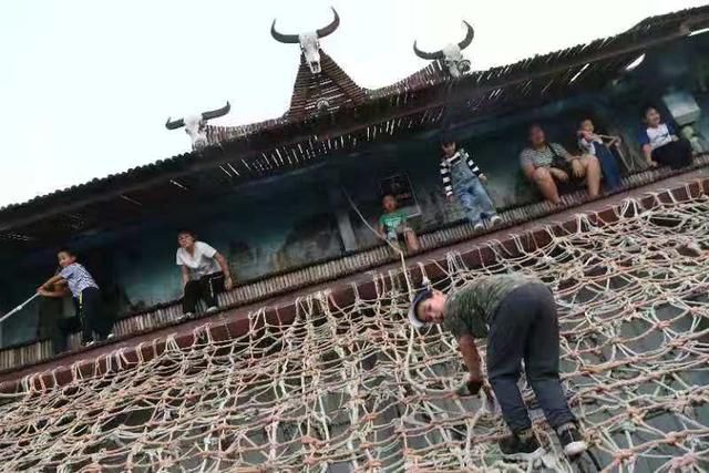 在北京大兴过火把节 体验“南果北种”