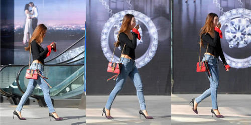 牛仔裤将腿部衬托的恰到好处,怎么搭配都是引人注意的焦点