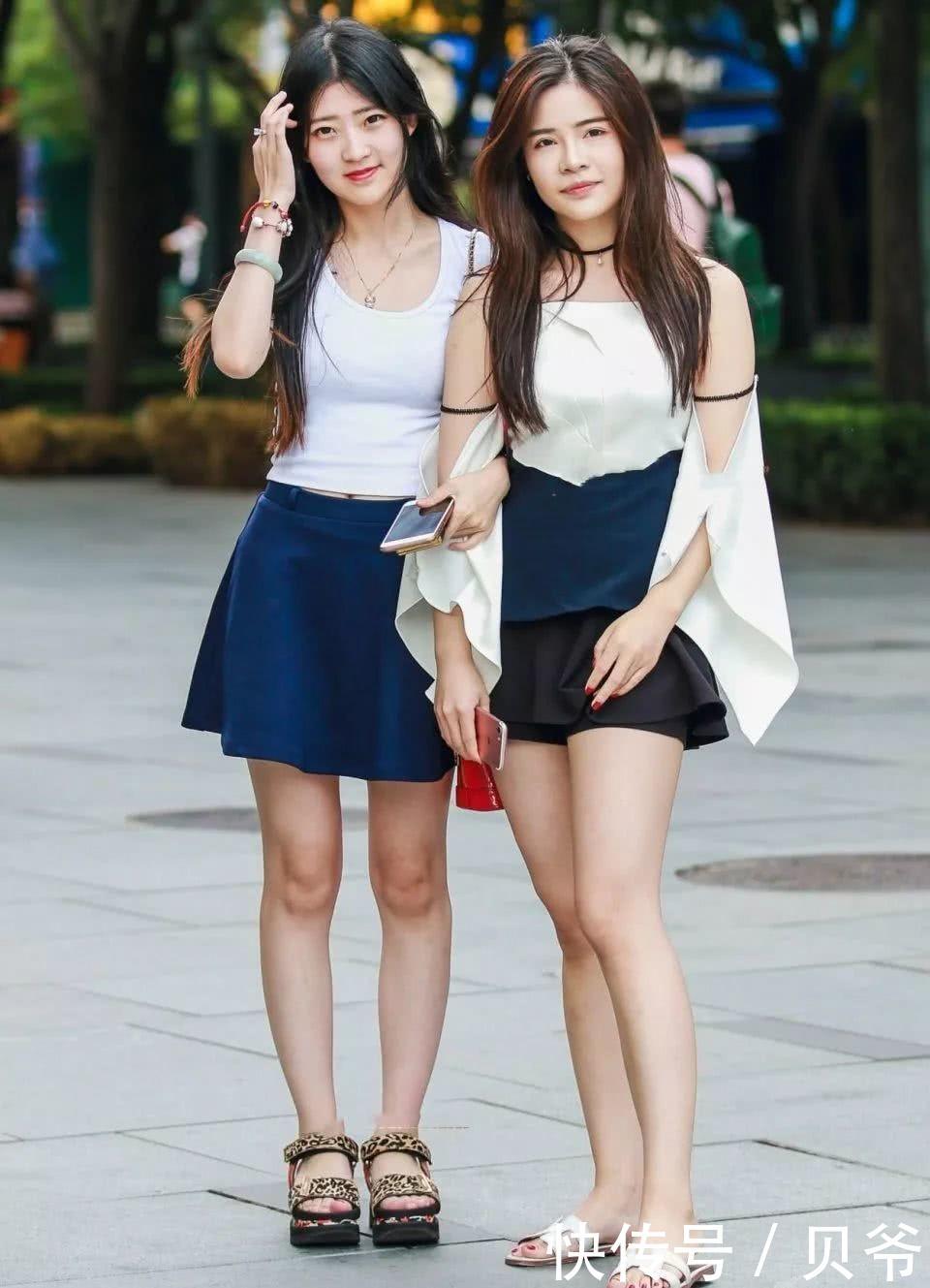 街拍美女，动感时尚与大气温婉的美让街头变成秀场……