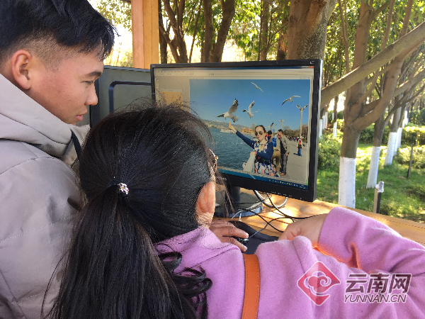 昆明海埂大坝拍照点所拍人鸥合影"造假"? 回应:根据游客意愿"P