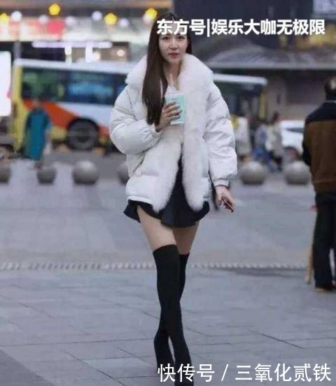 『美女』街拍:楚楚动人的美女,一件黑色背心配牛仔短裤,青春活力气质范