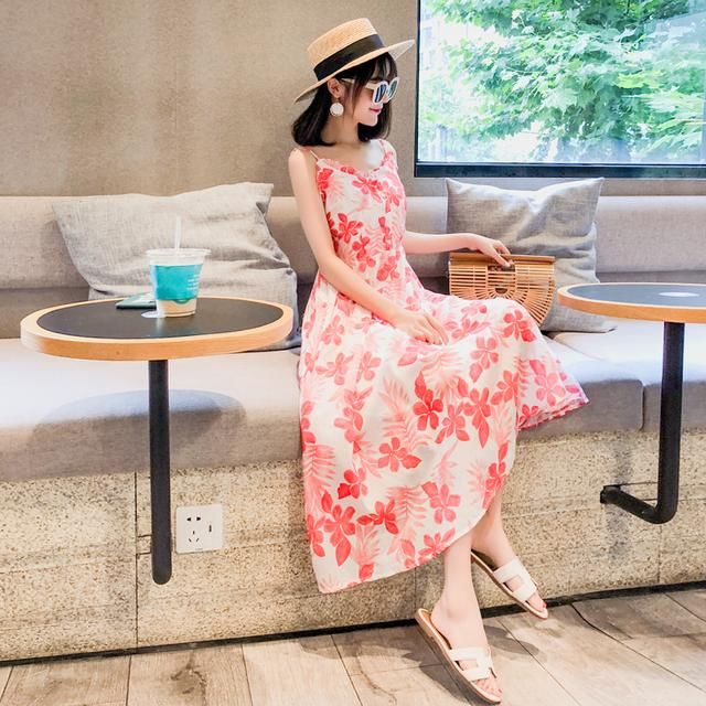 优雅唯美的度假风长裙，这样穿举手投足间尽显女人味!