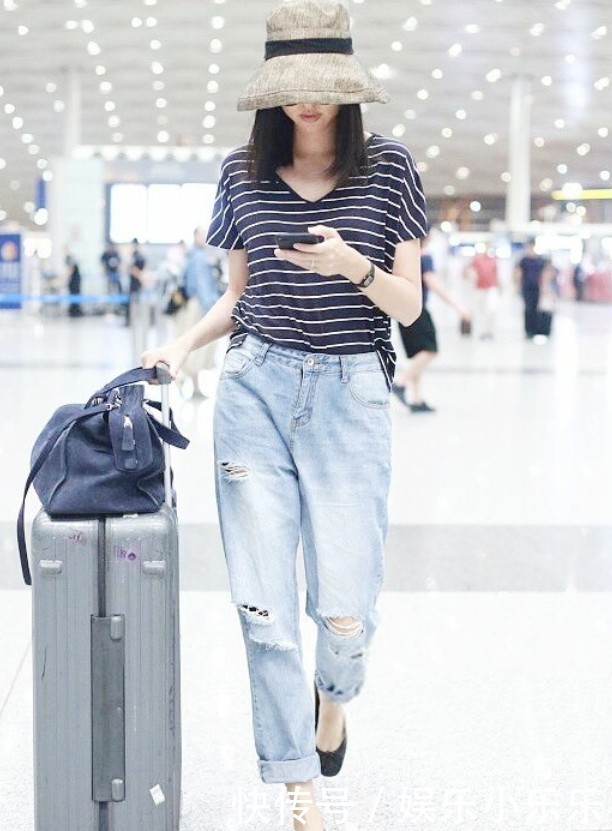 张梓琳不愧是合照杀手，即使穿上平底鞋，1米8的大长腿依旧秒杀众