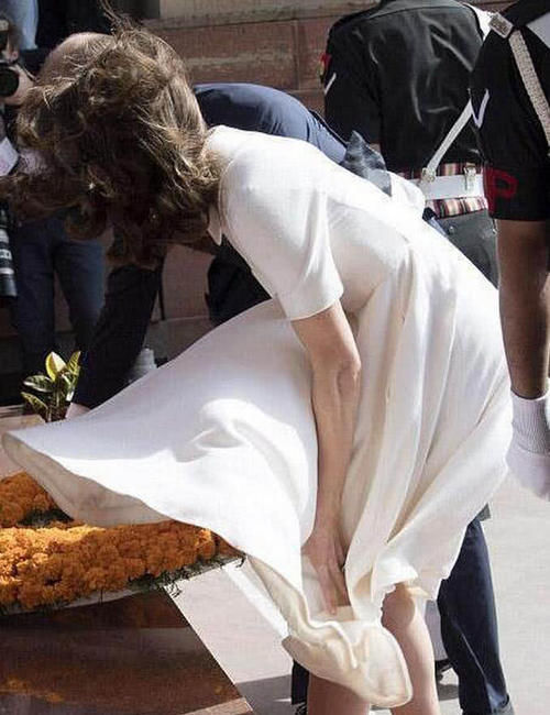 同样是被风掀起裙子，戴安娜的表现就很淡定，而卡米拉却显得很滑