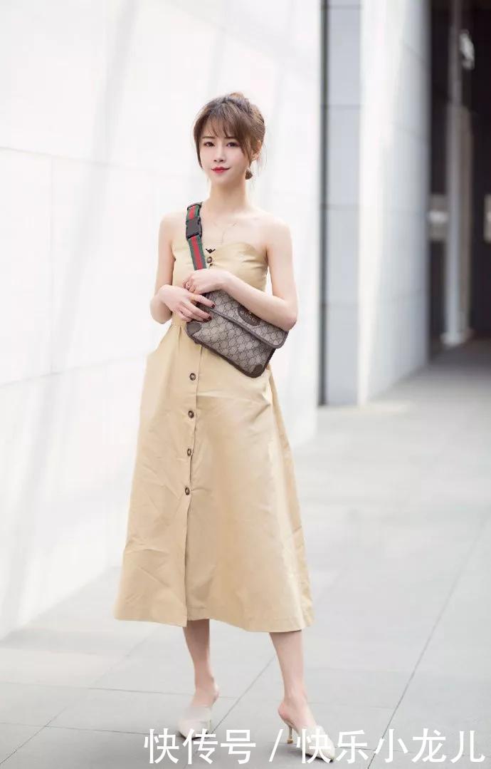 「美女」街拍:美女发丝随风飘扬,给人一种气质很优雅的感觉