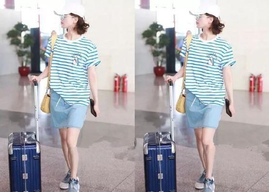 48岁吴奇隆与31岁刘诗诗少见机场秀恩爱，网友：17岁的差距还真大