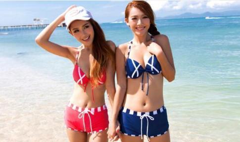 泳衣美女穿出漂亮身材，展现出美女迷人的魅力