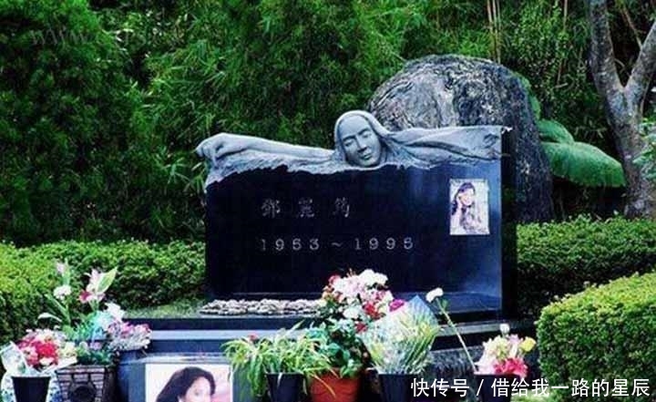  『实拍』实拍邓丽君墓地： 因歌迷长期贴照片, 早已失去原来的样子