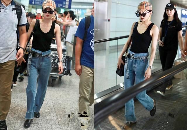 张韶涵太猛了，穿黑色背心去机场，雄性荷尔蒙将要爆发的节奏啊！