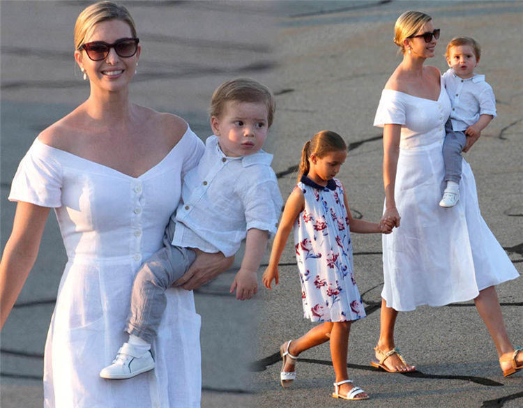 伊万卡穿露肩白裙现身，抱孩子笑容甜