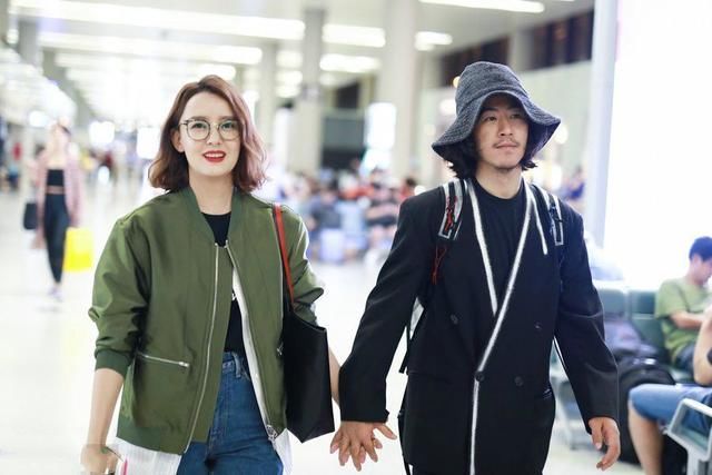 周奇奇江奇霖长袖长裤现身机场，网友：宫羽姑娘，你是真不怕热呀