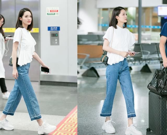 李沁衣品向来不错，紫色T恤配短裙嫩到飞起，脚下的鞋却一言难尽