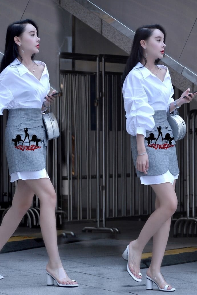 小姐姐将小西服当做裙子穿，恐怕就只有你才穿的这么有型了！