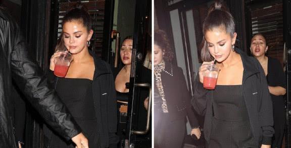 赛琳娜前往时装周，穿开叉裙好性感，不去看秀先去餐厅喝果汁？