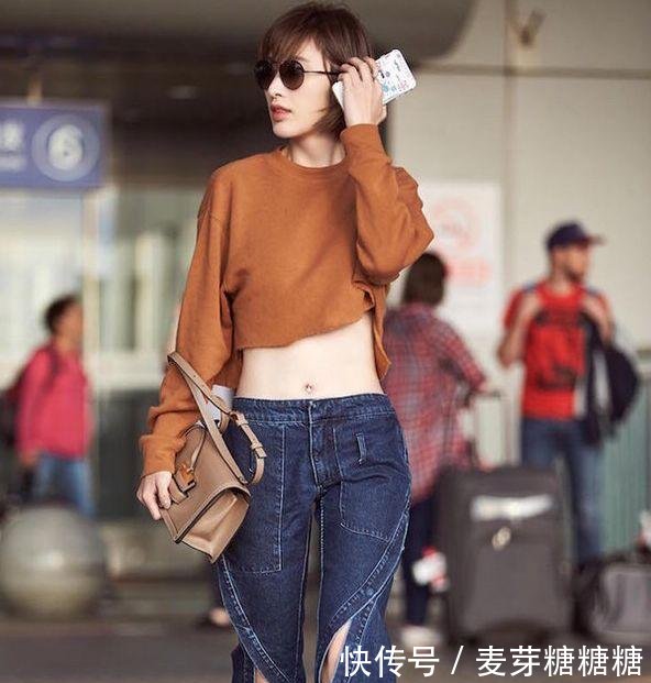 张俪豁出去了，肚脐眼儿镶钻也就算了，这裤子“裂”的也够个性