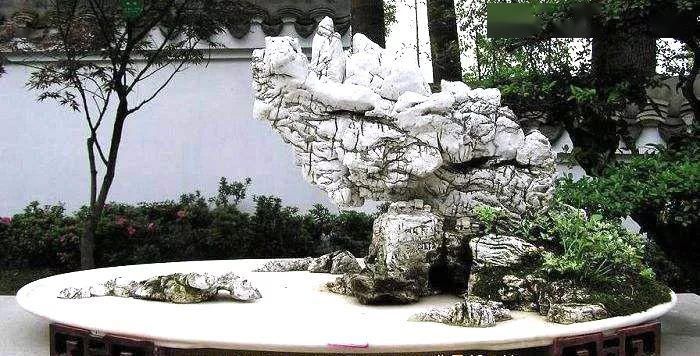  拆开：拆开山水盆景才恍然大悟，原来植物要这样才能固定在山石盆景！