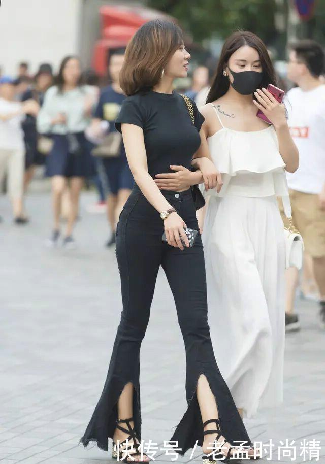  年轻|街拍：40岁就别再穿阔腿裤了, 现在流行“开叉裤”, 怎么搭都显年轻!