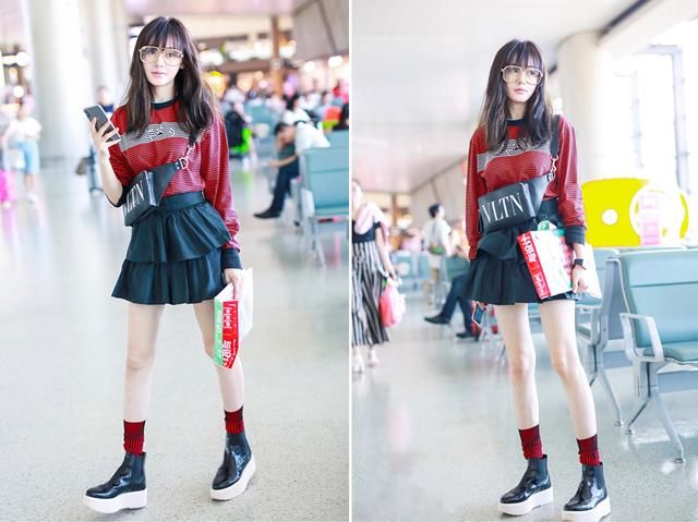 张天爱一改往日御姐风，现身机场剪了个小刘海，简直像换了张脸