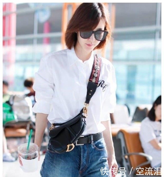 女生:街拍:美丽女生你真行,拥有这样的姿本才敢挑战这套衣服