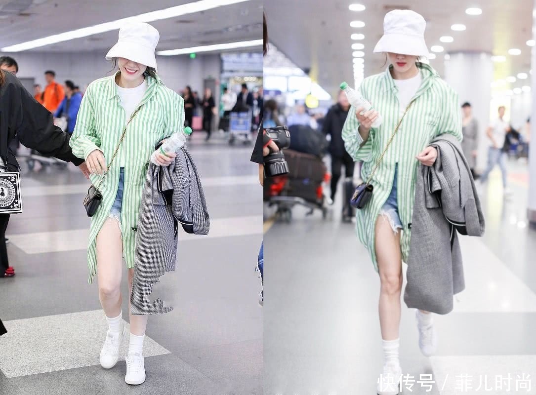 迪丽热巴真自信！穿条超短裤现机场，搭配长袜子毁一身！