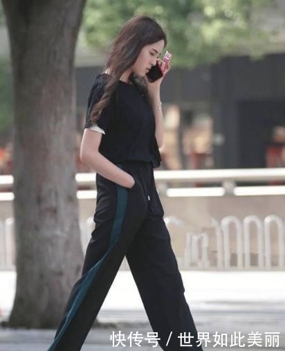 美女:街拍:黑色上衣+黑色长裤的美女,简单时尚又大方