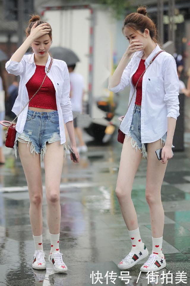 这么短的热裤美女也硬要穿，为了显腿长也是拼了，不过真的很美！